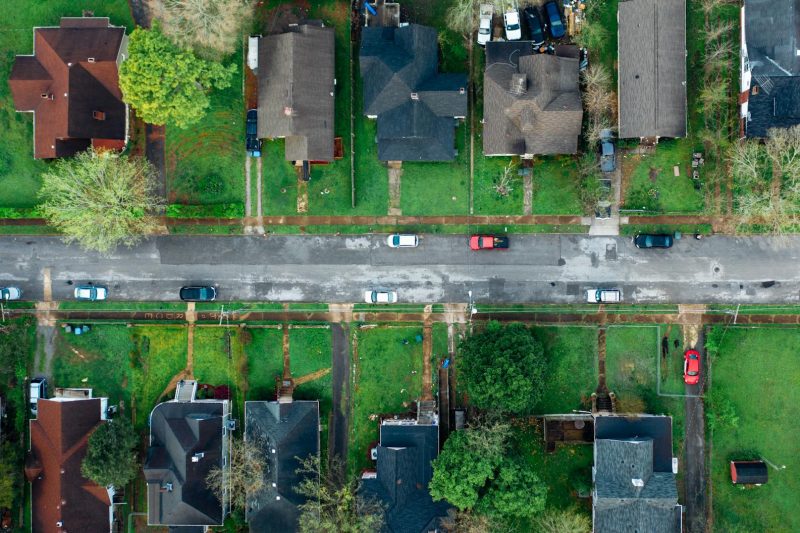 Home 14 Highangle aerial shot of a suburban neighborhood street line 1781024416